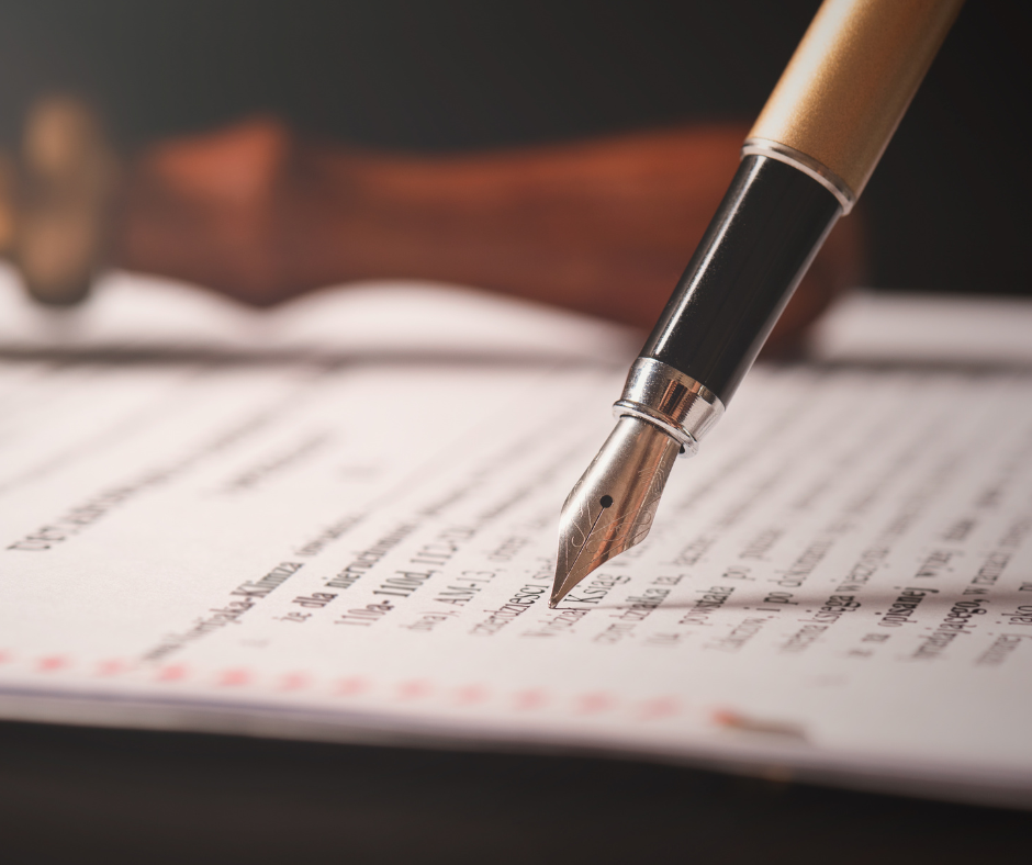 Pen writing on an estate-planning document
